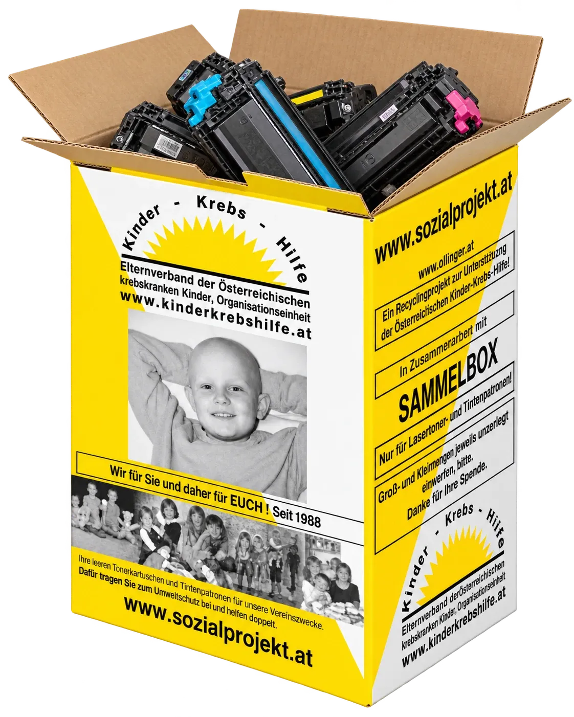 Offene gelbe Sammelbox der Kinder-Krebs-Hilfe, gefüllt mit leeren Tonerkartuschen